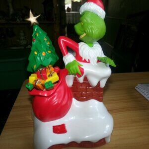 vintage the grinch animated bank. from radio shack.